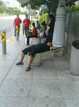 sleepinguncleb@busstop.JPG